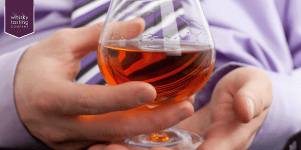 Man at whisky tasting session with a client