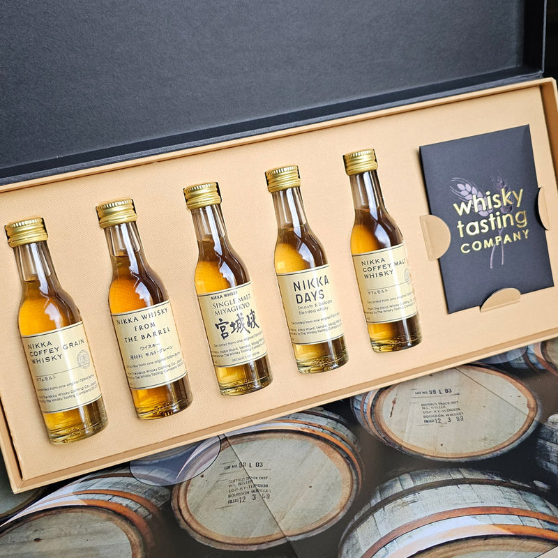 Luxury Japanese whisky gift box with tasting cards and whisky tasting mat