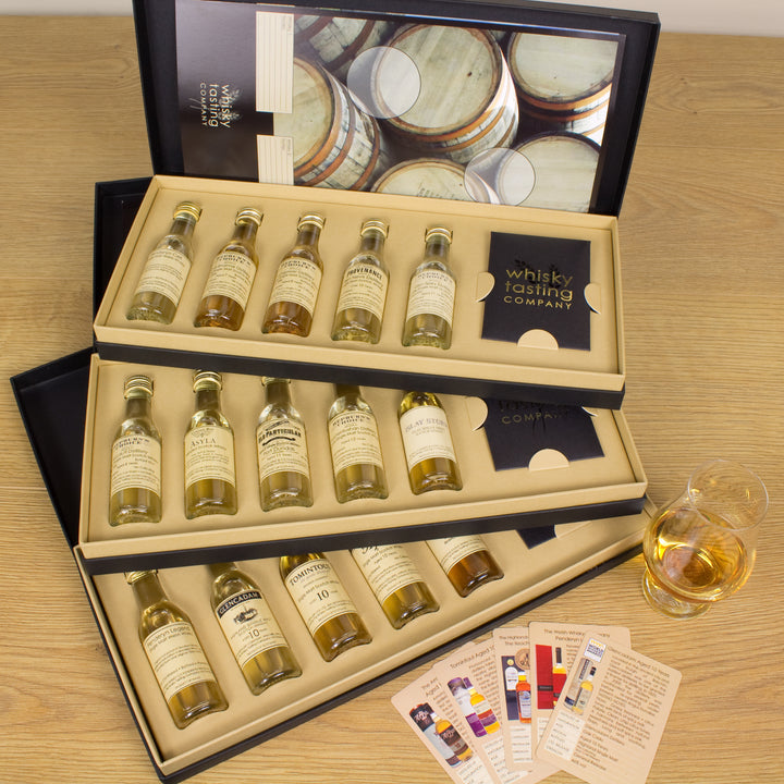 Single malt whisky gift subscription with individual tasting cards and a whisky tasting mat